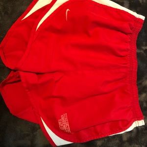Red Nike shorts